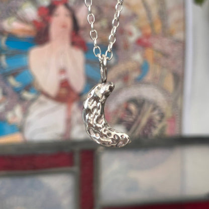 Crescent pendant