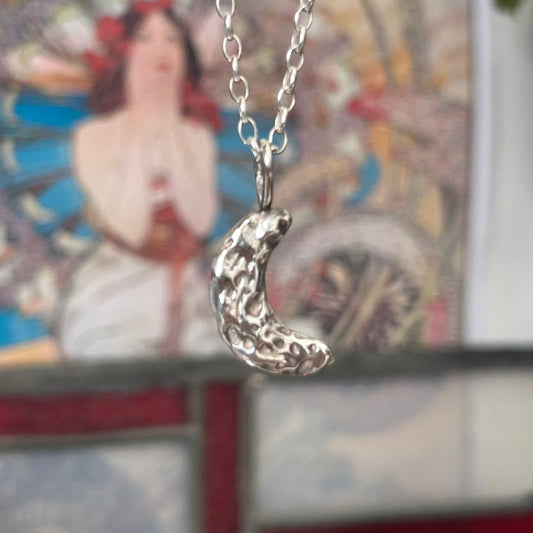 Crescent pendant