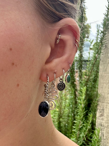 Enya dangles
